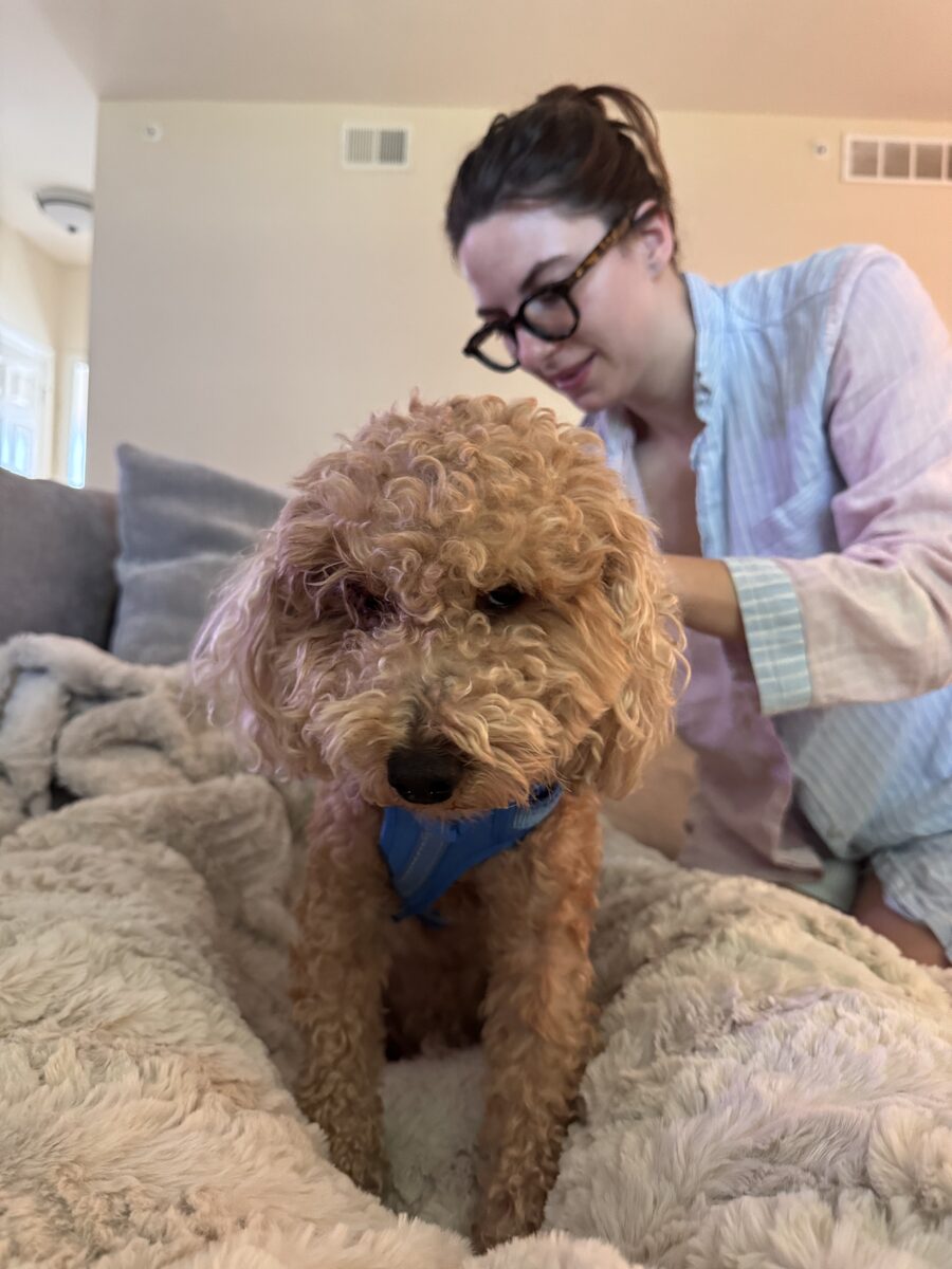 Beryl holding Brock in blanket