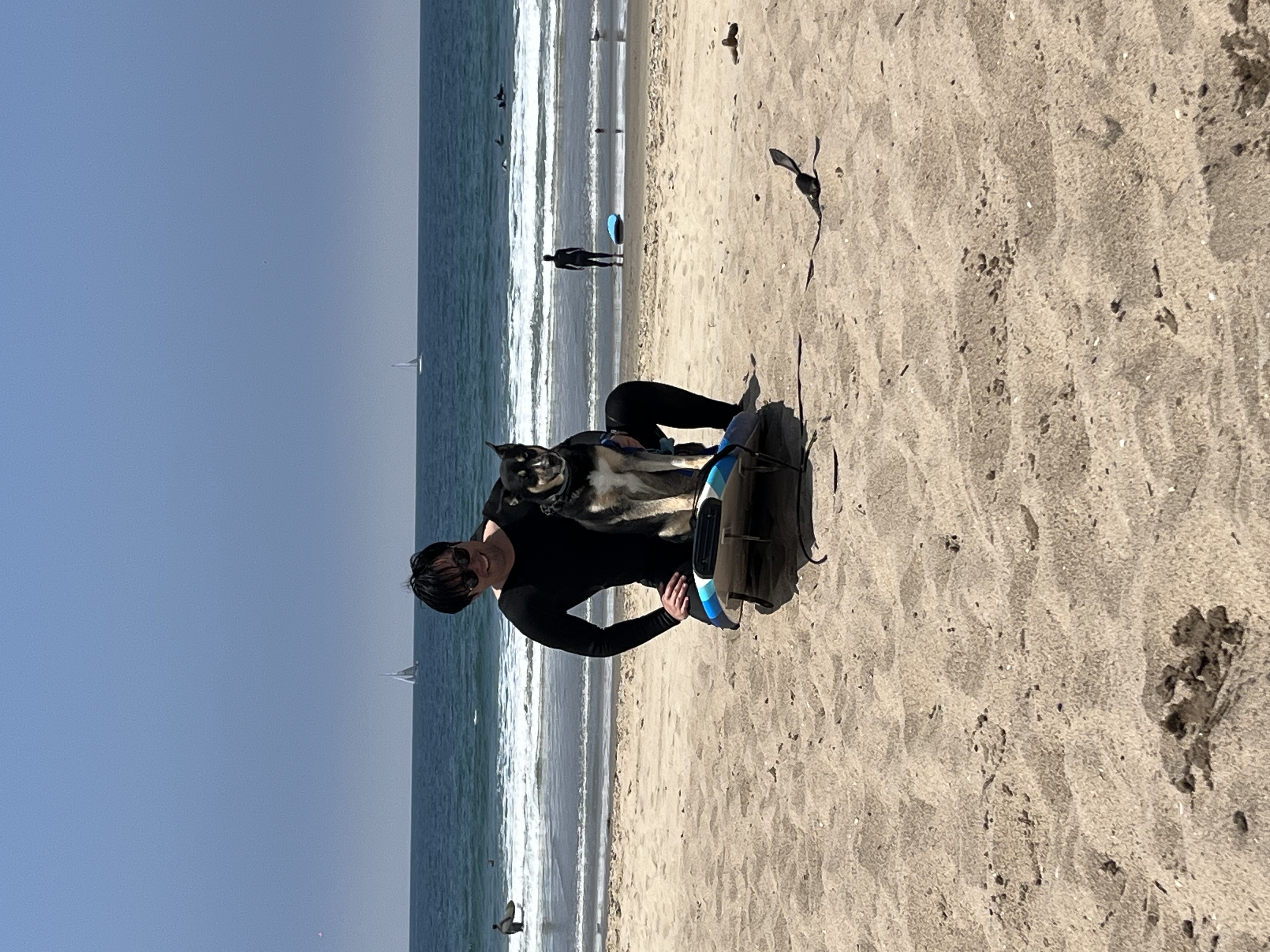 Kobe on a surfboard with Kevin